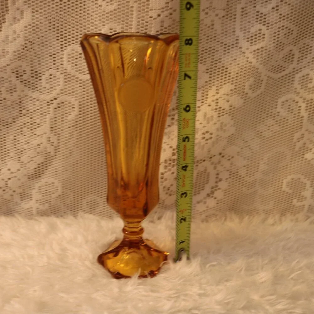 This Fostoria Amber vase coin glass vintage piece from the 1970s
